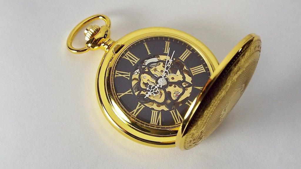 Gold pocket discount watch engraved